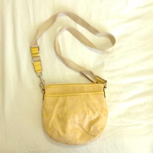 Yellow Coach crossbody purse